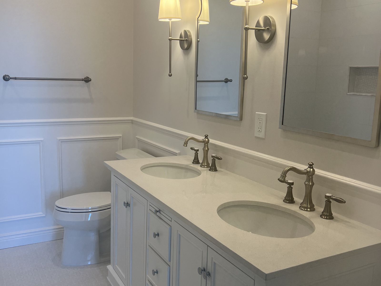 White double vanity with sconces